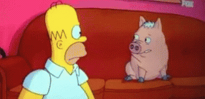 Homer Simpson And A Pig Are Sitting On A Couch . GIF
