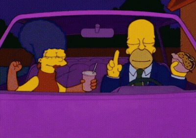 Homer Simpson Driving Purple Car With Marge Simpson GIF