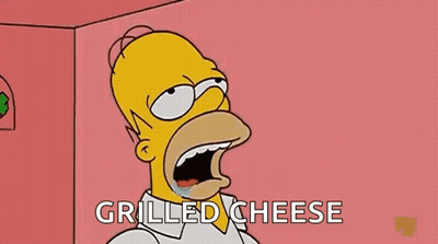 Homer Simpson Eating Grilled Cheese With Mouth Wide Open GIF