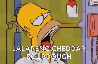 Homer Simpson Eating Jalapeno Cheddar Sourdough GIF