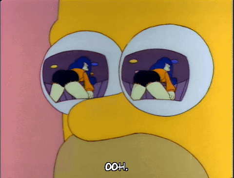 Homer Simpson From The Simpsons Is Laying Down With His Head In His Hands And His Eyes Closed . GIF