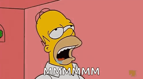 Homer Simpson From The Simpsons Is Screaming With His Mouth Open And The Words Mmmmm Written Below Him GIF