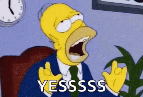 Homer Simpson From The Simpsons Is Sitting In A Chair With His Mouth Open And Making A Funny Face . GIF