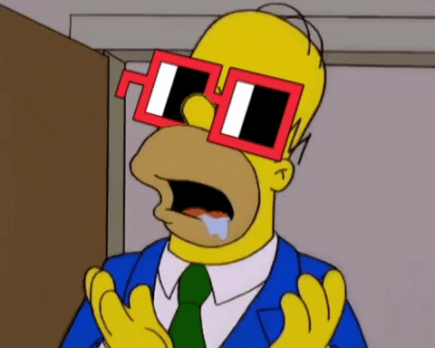 Homer Simpson From The Simpsons Wearing Sunglasses And A Blue Suit GIF