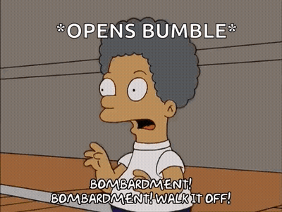 Homer Simpson Holding Boxing Glove And Pointing GIF