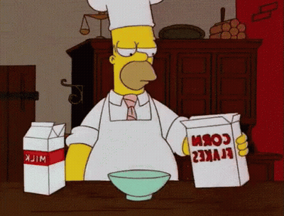 Homer Simpson Holding Corn And Milk GIF