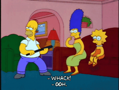Homer Simpson Holding Gun Woman On Couch GIF
