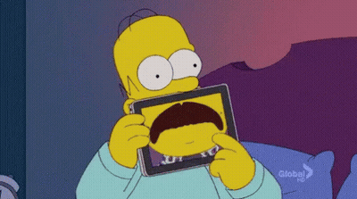 Homer Simpson Holding Tablet With Mustache Picture GIF