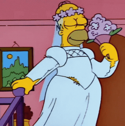 Homer Simpson In A Bride 'S Dress Holding A Bouquet Of Flowers GIF