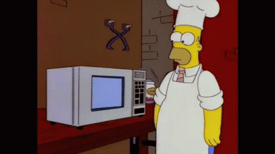 Homer Simpson In Chef Hat In Front Of Microwave GIF