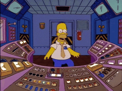 Homer Simpson In Control Room With Fire Extinguisher GIF