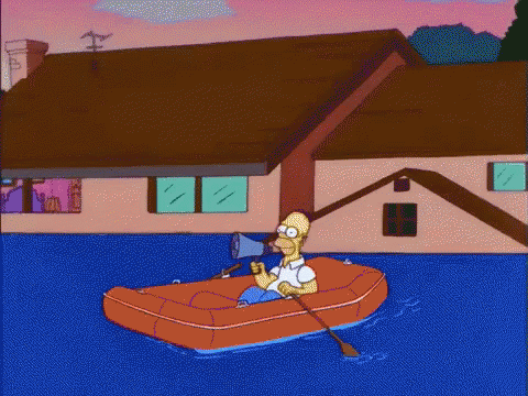 Homer Simpson In Raft With Megaphone In Mouth GIF