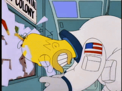 Homer Simpson In Space Suit Looking At Colony Sign GIF