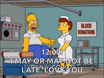 Homer Simpson Is Giving Blood To A Nurse In A Hospital . GIF