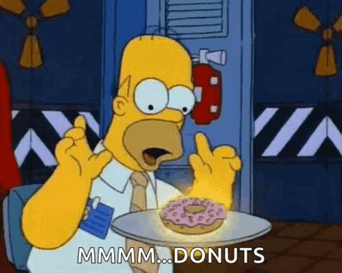Homer Simpson Is Holding A Plate With A Donut On It . GIF