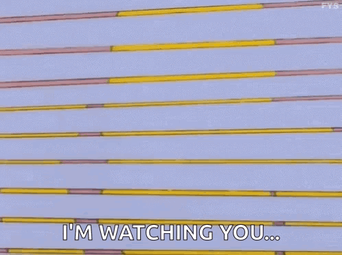 Homer Simpson Is Peeking Out From Behind A Door And Saying `` I 'M Watching You ... '' GIF