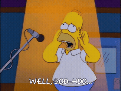 Homer Simpson Is Screaming Into A Microphone And Says Well Boo Hoo GIF