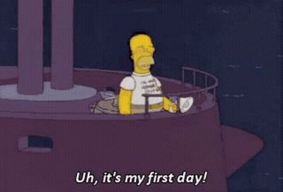Homer Simpson Is Talking Into A Megaphone On A Boat . GIF