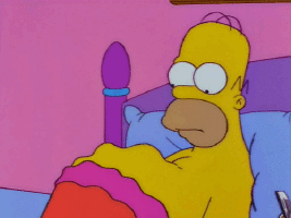 Homer Simpson Laying On Pink Blanket GIF