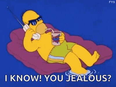 Homer Simpson Laying Talking On Phone Drinking Smoothie GIF