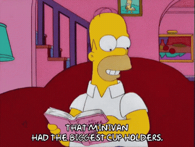 Homer Simpson Reading Book About Minivan Cup Holders GIF