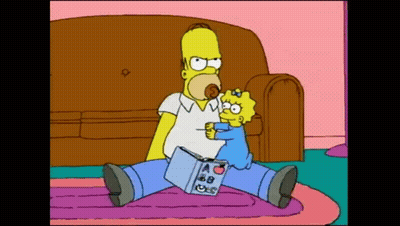 Homer Simpson Reading Book to Maggie