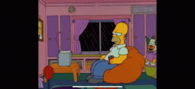 Homer Simpson Sitting In Bean Bag Chair With Soda GIF