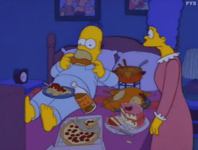 Homer Simpson Sitting On Bed Eating Pizza And Drinking Diet Cola GIF