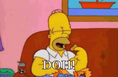 Homer Simpson Sitting On Couch Eating Chips GIF