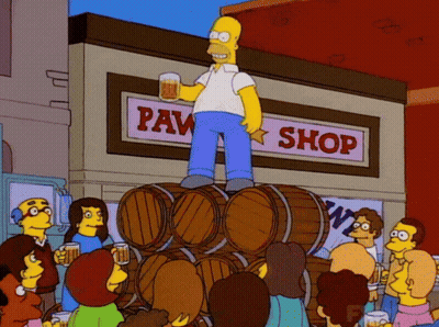 Homer Simpson Stands On Top Of A Pile Of Barrels In Front Of A Paw Shop GIF