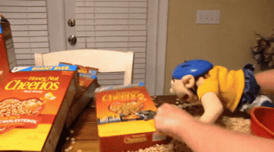 Honey Nut Cheerios Box On Wooden Table GIF