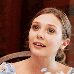Hopeful Elizabeth Olsen Stare GIF