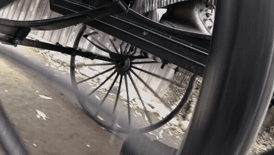 Horse Drawn Carriage Wheel With Smoke GIF