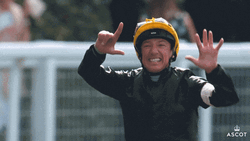 Horse Racer Showing 7 Fingers GIF