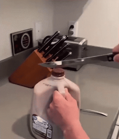Hot Choco Being Poured Into Cup On Saucer GIF