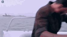 Hot Guy Holding A Gun GIF