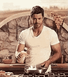 Hot Man Is Cooking GIF