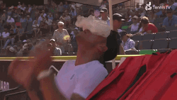 Hot Outside Ice Pack On Face Tennis Player GIF