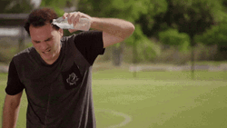 Hot Outside Man Dousing Self With Water GIF