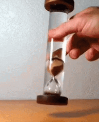 Hourglass Floating Inside Tube GIF