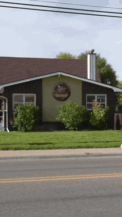 House With Coffee House Sign GIF