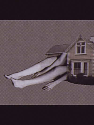 House With Person's Legs Coming Out GIF
