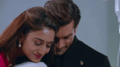 Hugging Man And Woman With Bindi GIF