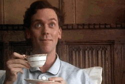 Hugh Laurie Tea Laugh GIF