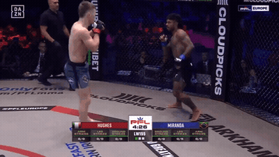 Hughes Fighting Miranda In A Cage GIF