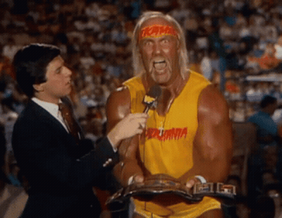 Hulk Hogan Interviewed by Man in Suit in Crowd