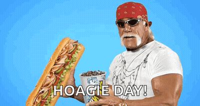Hulk Hogan Is Holding A Sub Sandwich And A Cup Of Soda With Hoagie Day Written On The Bottom GIF