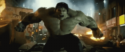 Hulk Standing In City With Fist Out GIF