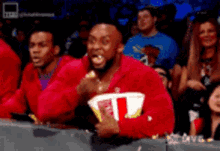 Hyper Active Sports Fan Gobbling Down On Popcorn Meme