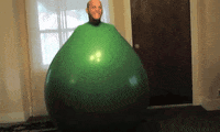 Hyper Man In Green Bouncy Ball GIF